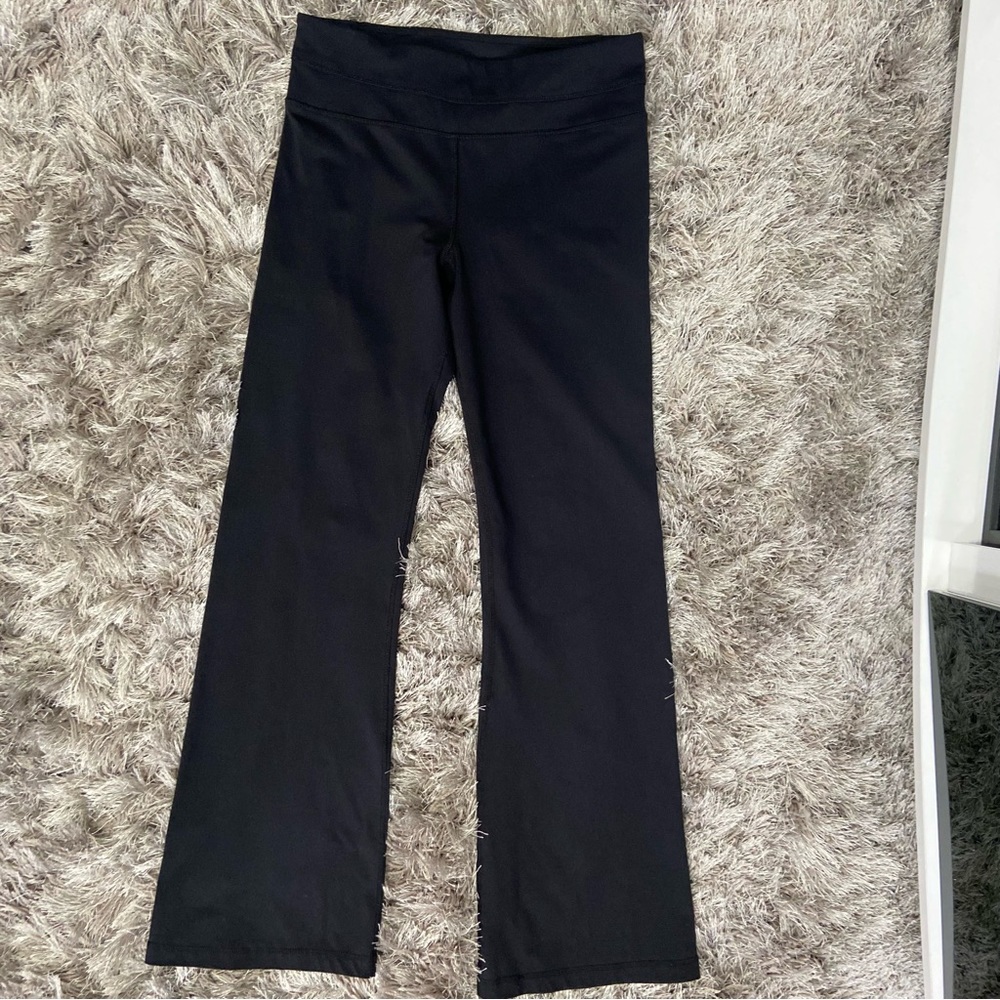Lululemon women black wide leg, waistband hidden pocket yoga pants. Size S. Used